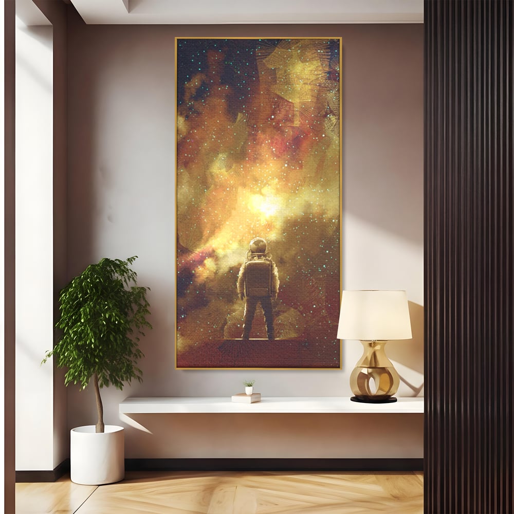 Tablou canvas cu ilustratie cu astronaut privind stelele, in rama de aluminiu auriu